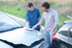 two man finding a friendly agreement after a car accident